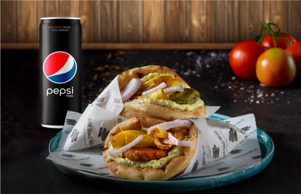 two vegan pitas with pepsi